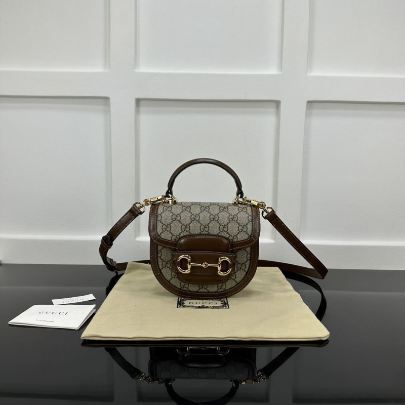 G*u*i top handle bags